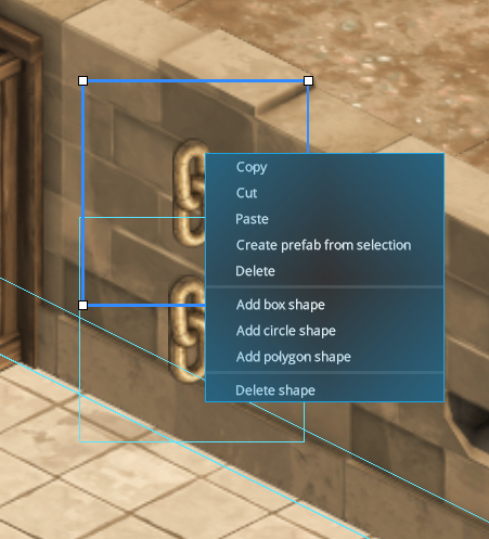 A selected box collision shape with resize handles and the Physics shape context menu in Pixscape Studio